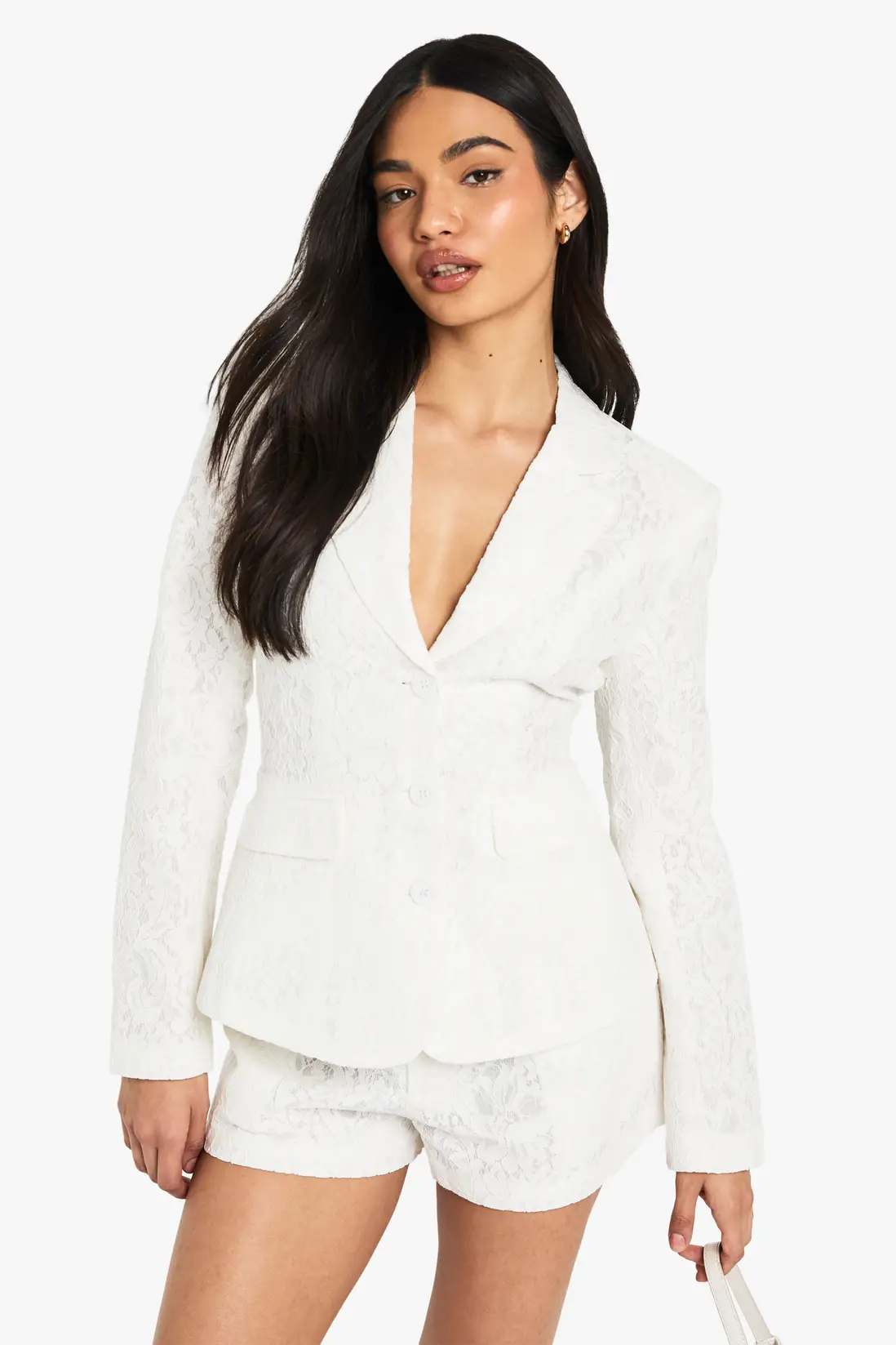 Bride wearing white occasion lace shorts — styled look
